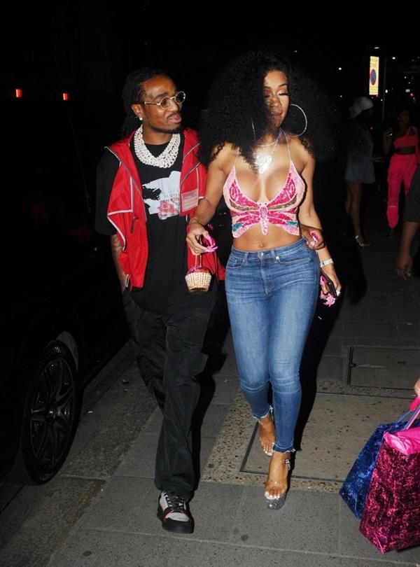 Saweetie sexy boobs showing nice cleavage seen by paparazzi with Quavo.












