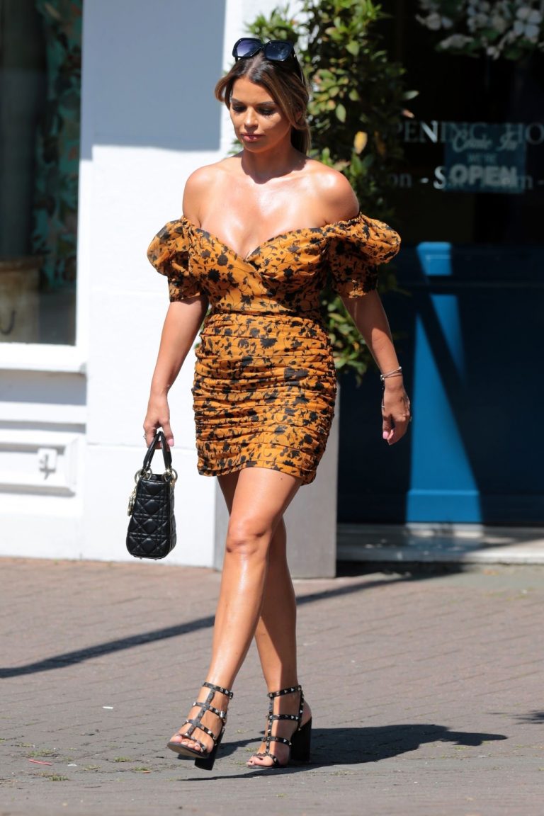 Tanya Bardsley Pictures Tanya Bardsley sexy cleavage in a dress seen by paparazzi.