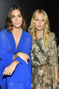 Mandy Moore braless boobs in a see through blue dress showing her tits.


