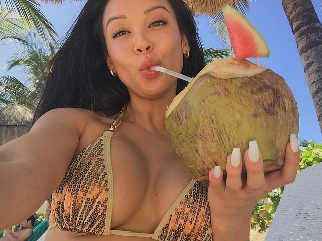 Dannie Riel in a bikini taking a selfie