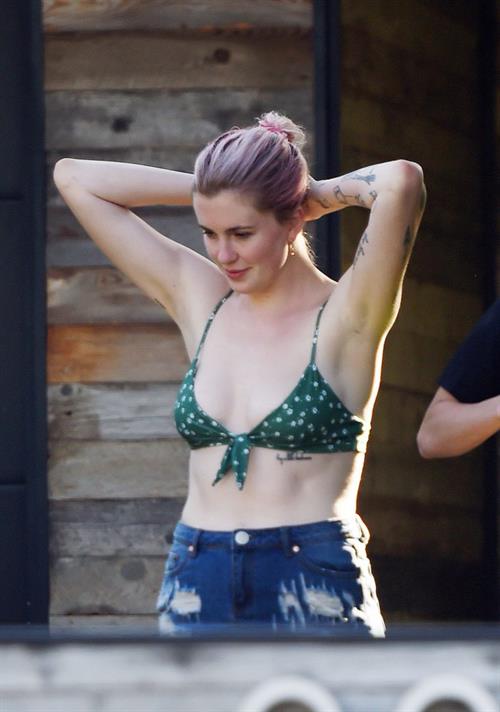 Ireland Baldwin Pictures Ireland Baldwin sexy in a bikini top seen by paparazzi showing some nice cleavage.
