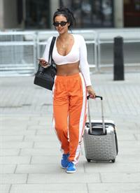 Maya Jama sexy in a crop top showing some nice cleavage seen by paparazzi.











