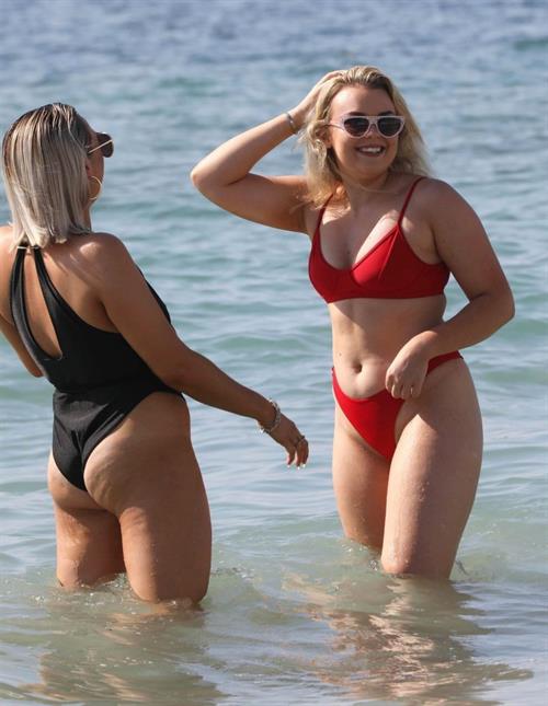 Tallia Storm Bikini Pictures Tallia Storm sexy in a red bikini seen by paparazzi at the beach.