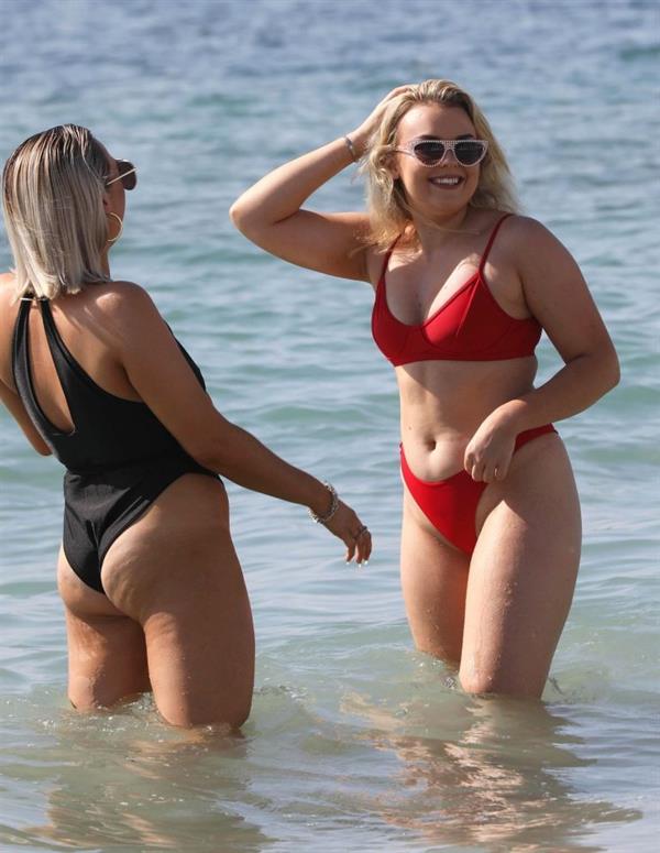 Tallia Storm sexy in a red bikini seen by paparazzi at the beach.











