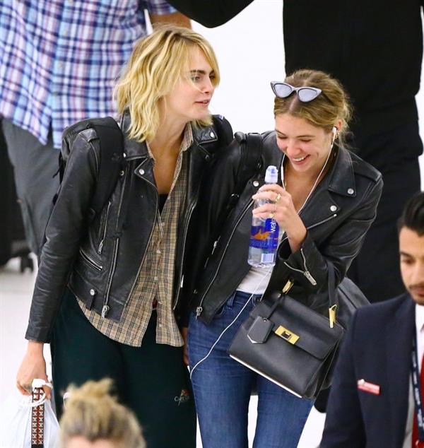 Cara Delevingne and Ashley Benson kissing at the airport.






















