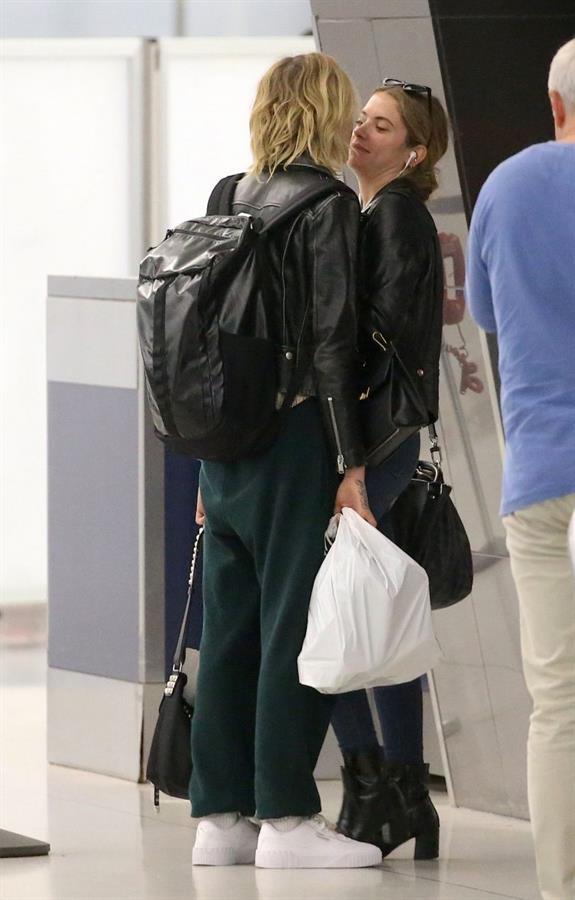 Cara Delevingne and Ashley Benson kissing at the airport.






















