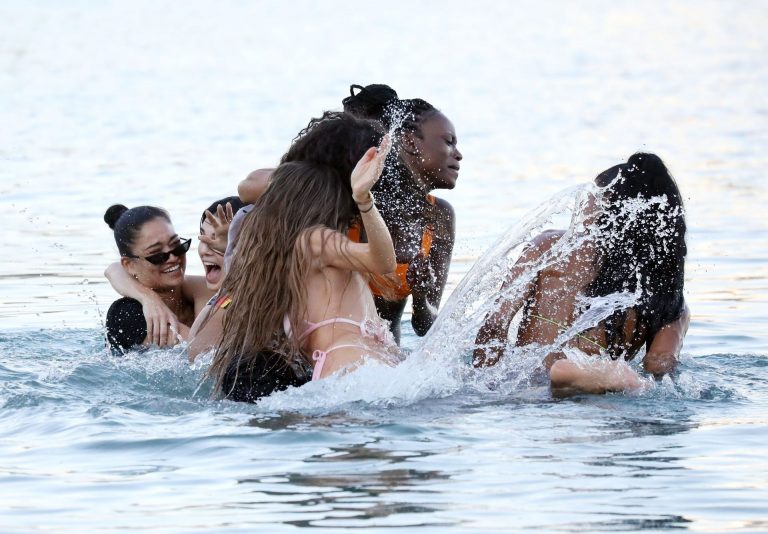 Kendall Jenner sexy ass in a thong bikini seen by paparazzi in the water at the beach.




























