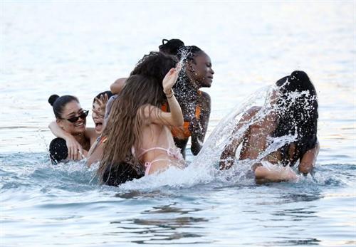 Kendall Jenner Bikini Pictures Kendall Jenner sexy ass in a thong bikini seen by paparazzi in the water at the beach.