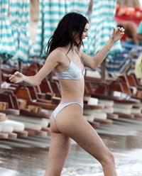 Kendall Jenner sexy ass in a thong bikini seen by paparazzi in the water at the beach.




























