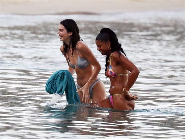 Kendall Jenner sexy ass in a thong bikini seen by paparazzi in the water at the beach.




























