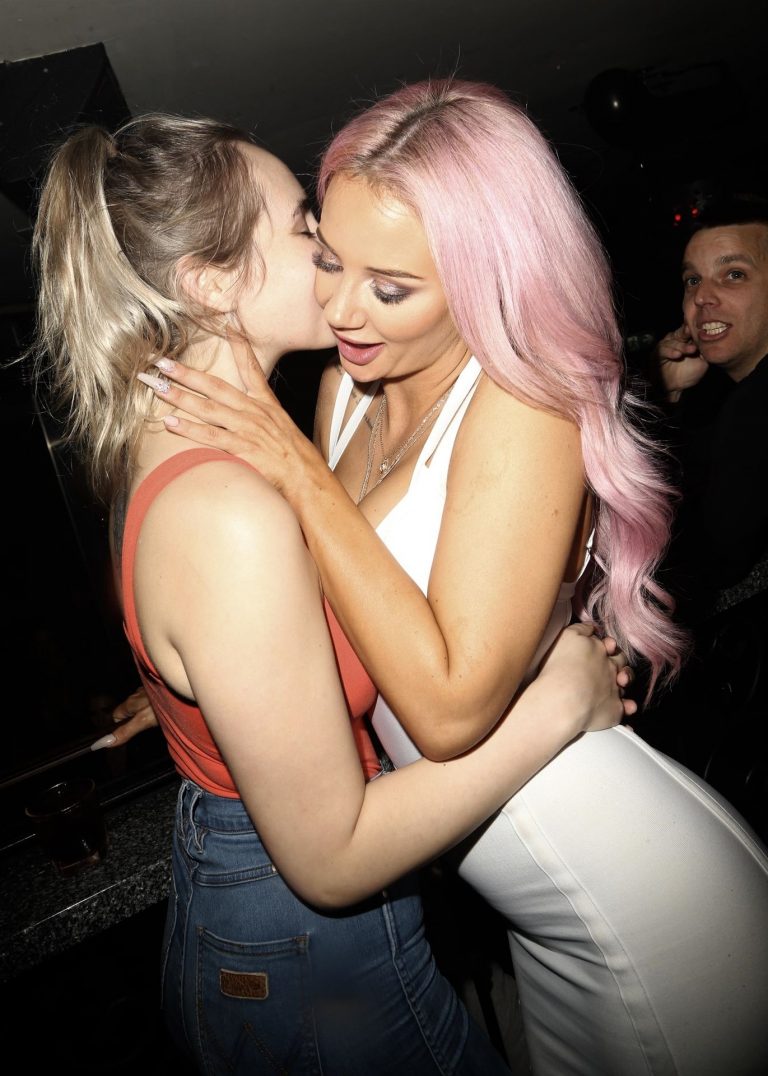 Jessika Power Pictures Jessika Power sexy lesbian kiss out partying in a white dress showing some nice cleavage.