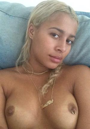 Sami Miro taking a selfie and - breasts