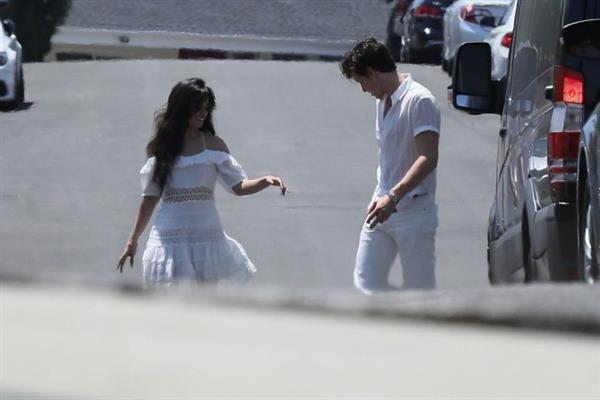 Camila Cabello sexy ass in a white dress seen with Shawn Mendes by paparazzi.


