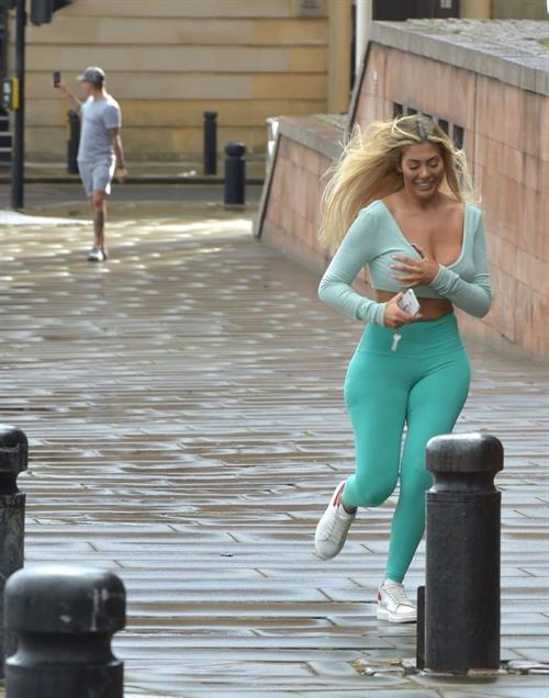 Chloe Ferry Pictures Chloe Ferry braless tits pokies in a tight blue outfit showing off her ass and boobs seen by paparazzi.