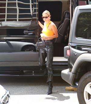 Hailey Bieber braless tits pokies seen by paparazzi in a halter top.





