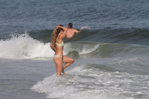 Nina Agdal sexy ass in a thong bikini at the beach with her boyfriend seen by paparazzi.











