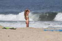 Nina Agdal sexy ass in a thong bikini at the beach with her boyfriend seen by paparazzi.











