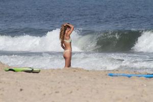 Nina Agdal sexy ass in a thong bikini at the beach with her boyfriend seen by paparazzi.











