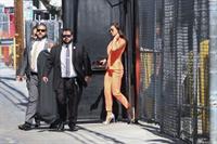 Alex Morgan braless and sexy in a orange jacket seen by paparazzi.








