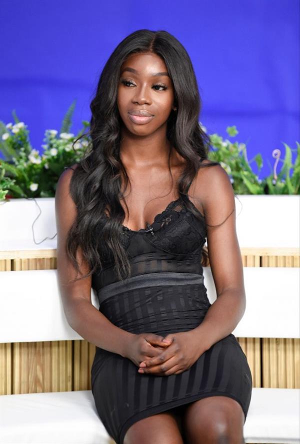 Yewande Biala from Love Island sexy in a tight black dress on  I Saw It First HQ .















