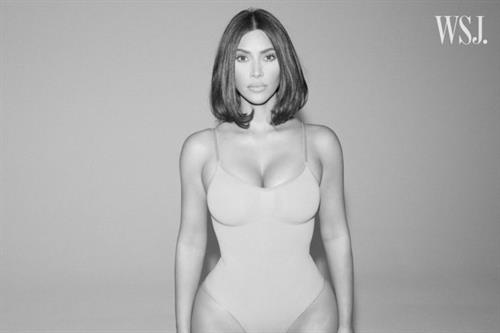 Kim Kardashian sexy new photo shoot for WSJ showing nice cleavage in her shape wear.































