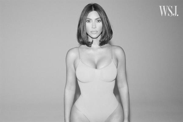 Kim Kardashian sexy new photo shoot for WSJ showing nice cleavage in her shape wear.






























