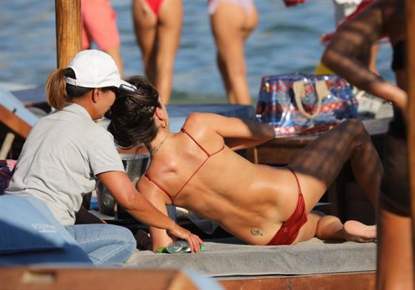Alessandra Ambrosio topless and sexy at the beach in a thong bikini showing off her perfect model ass and boobs.
































