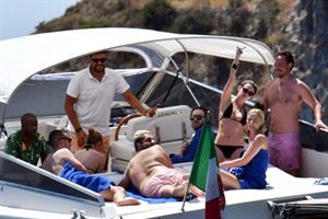 Kristen Stewart nude boobs caught topless by paparazzi tanning on a boat.
