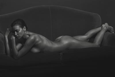 Irina Shayk nude photo shoot showing her naked boobs and ass.








