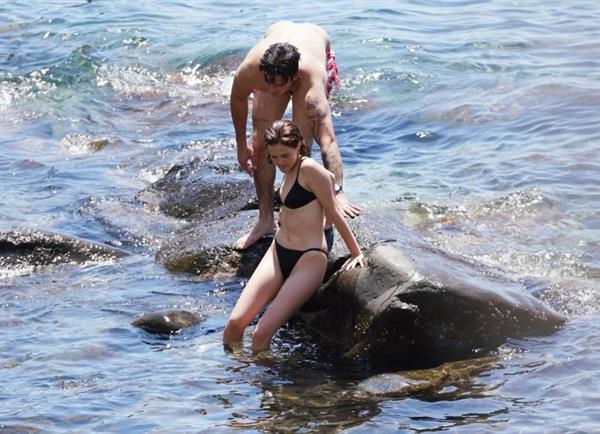 Zoey Deutch sexy boobs and ass in a little bikini in the water seen by paparazzi.



















