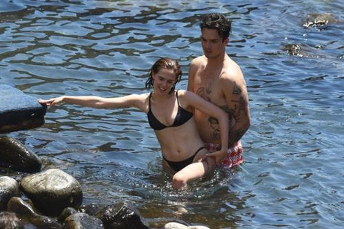 Zoey Deutch Bikini Pictures Zoey Deutch sexy boobs and ass in a little bikini in the water seen by paparazzi.