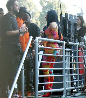 Cardi B boobs and booty on display on and off stage showing nice cleavage and her sexy ass in a tight dress.























