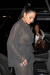 Nicole Scherzinger sexy in a see through outfit showing her braless boobs and ass seen by paparazzi.
