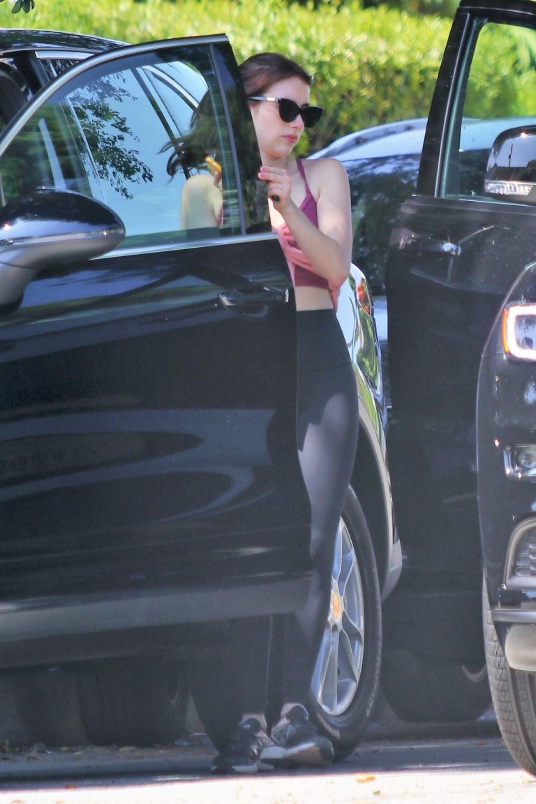 Emma Roberts Pictures Emma Roberts sexy little ass and thigh gap in tight pants seen by paparazzi with Garrett Hedlund.