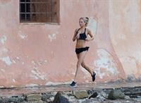Kimberley Garner at the beach with her dog