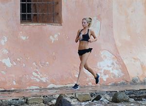 Kimberley Garner at the beach with her dog