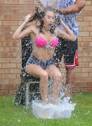 Chloe Goodman gets water dumped on her
