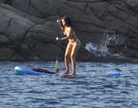 Rihanna paddle boarding