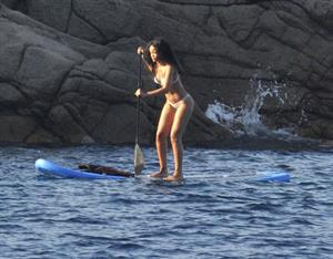 Rihanna paddle boarding