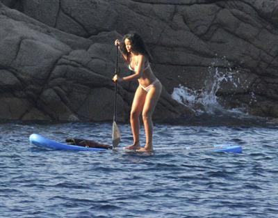 Rihanna paddle boarding