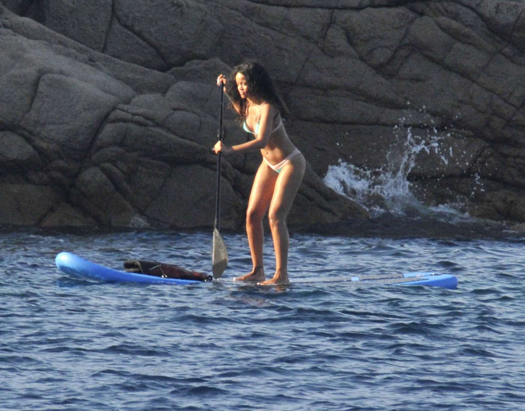 Rihanna paddle boarding