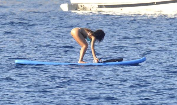 Rihanna paddle boarding