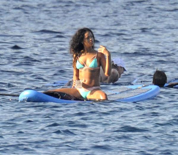 Rihanna paddle boarding