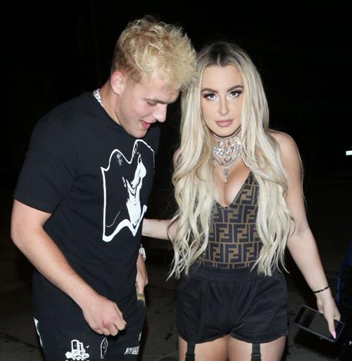 Tana Mongeau Pictures Tana Mongeau sexy cleavage in a revealing little outfit with Jake Paul.