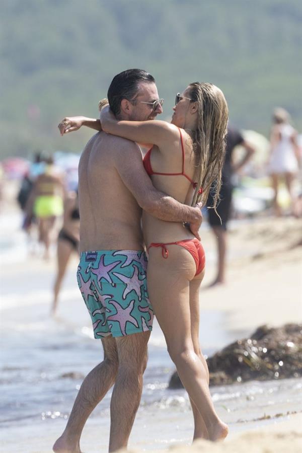 Sylvie Meis sexy ass in a bikini at the beach with her new boyfriend at the beach seen by paparazzi.















