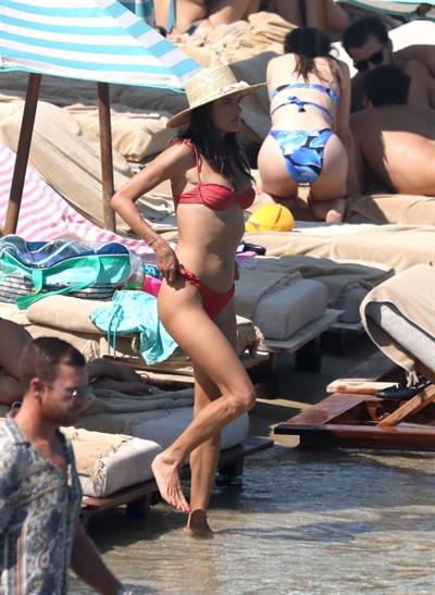 Alessandra Ambrosio perfect model body in a sexy little thong bikini seen at the beach by paparazzi showing nice cleavage and ass.





















