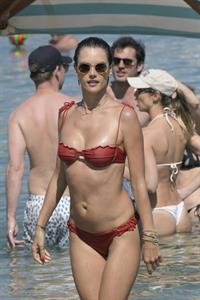 Alessandra Ambrosio perfect model body in a sexy little thong bikini seen at the beach by paparazzi showing nice cleavage and ass.





















