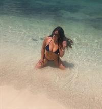 Claudia Romani nude photos at the beach showing her sexy ass and holding her topless boobs in a thong bikini.









































