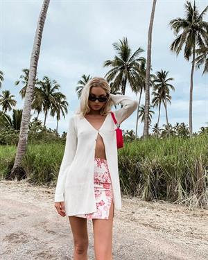 Elsa Hosk braless tits pokies in an open top.















































