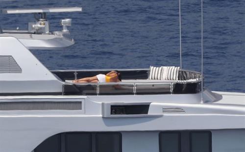 Silvia Toffanin Pictures Silvia Toffanin nipple pokies in a wet sexy swimsuit seen by paparazzi on a yacht.